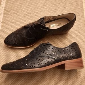 LOUISE ET CIE ANNACIS ALMOND TOE PREFORATED LEATHER OXFORDS IN BLACK